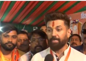 Chirag Paswan addressing media on NDA manifesto in Patna Chirag Paswan unveiling NDA Sankalp Patra for Bihar 2025 NDA leaders presenting Bihar vision document Chirag Paswan talking about industrial development in Bihar