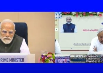 PM Modi addressing youth virtually from Delhi Bihar CM Nitish Kumar at Patna youth event IIT toppers felicitated at Science Bhawan Delhi Bihar youth skill development program ceremony Modi Nitish youth employment announcement in Patna