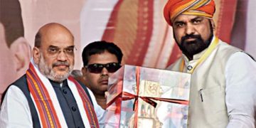 Amit Shah Bihar rally promise photo Samrat Choudhary takes charge Home Ministry Vijay Sinha Deputy CM Bihar portfolio image