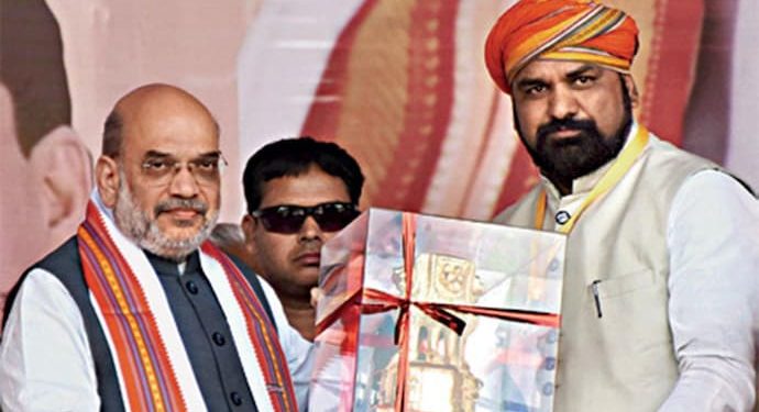 Amit Shah Bihar rally promise photo Samrat Choudhary takes charge Home Ministry Vijay Sinha Deputy CM Bihar portfolio image