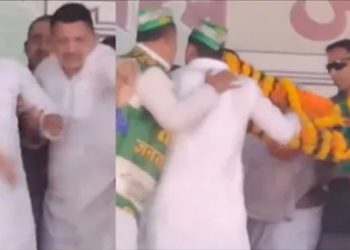 Nitish Kumar Gaya Rally Stage Collapse Photo CM Nitish Kumar addressing crowd in Gaya Security personnel helping Nitish Kumar after stage collapse JDU Manorama Devi Rally in Gaya Bihar