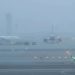 Delhi Airport passenger advisory fog, IGI Airport low visibility notice, Delhi flight operations fog update, airport advisory image