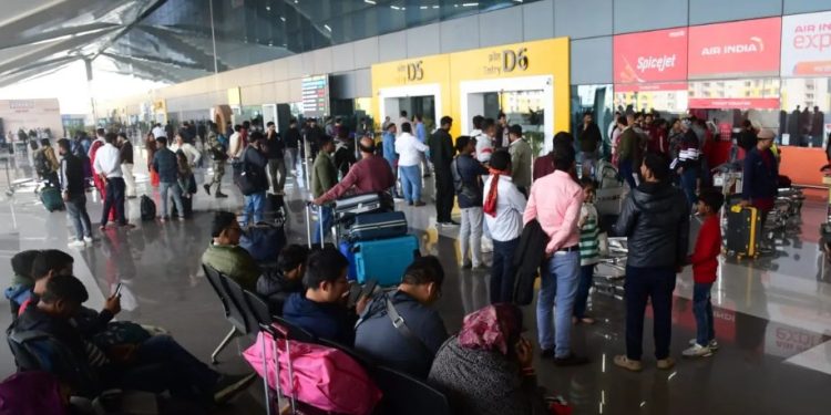 Indigo flight cancellation chaos at Indian airports Passengers protesting after Indigo flight delays Railway special trains announced amid Indigo crisis Crowded Indian airports during Indigo operational issue
