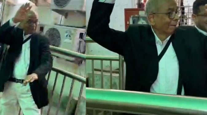 Rakesh Kishore Delhi Court Incident Image BR Gavai Shoe Attack Case Photo Karkardooma Court Lawyers Clash Image Delhi Court Security Personnel Saving Lawyer Photo