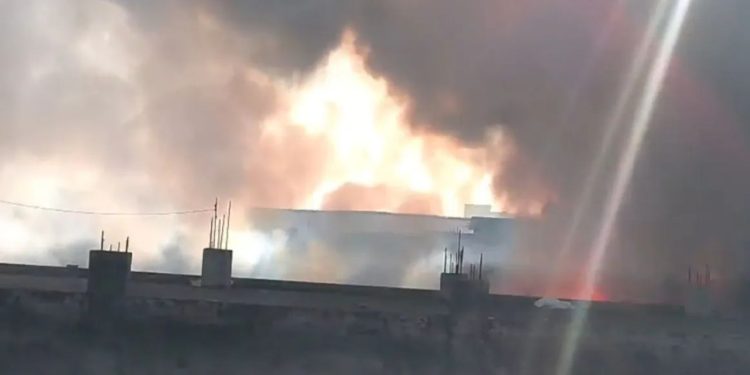 Bhiwadi factory blast site, Rajasthan chemical factory fire, Bihar migrant workers victims, fire brigade rescue operation, East Champaran families mourning