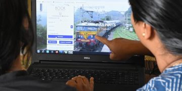 IRCTC AI predictor system on website Indian Railways online ticket booking process IRCTC login screen monitoring system Passenger booking train ticket online India